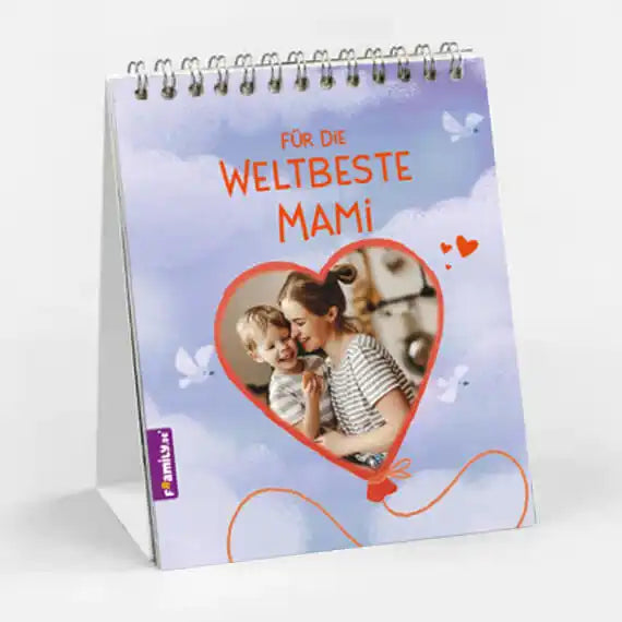 Der Framily Tischkalender weltbeste Mama ist ein spiralgebundener Kalender mit einem lila-blauen Einband, einem herzförmigen Luftballon und der Botschaft "Für die weltbeste Mami". Perfekt für den Muttertag.